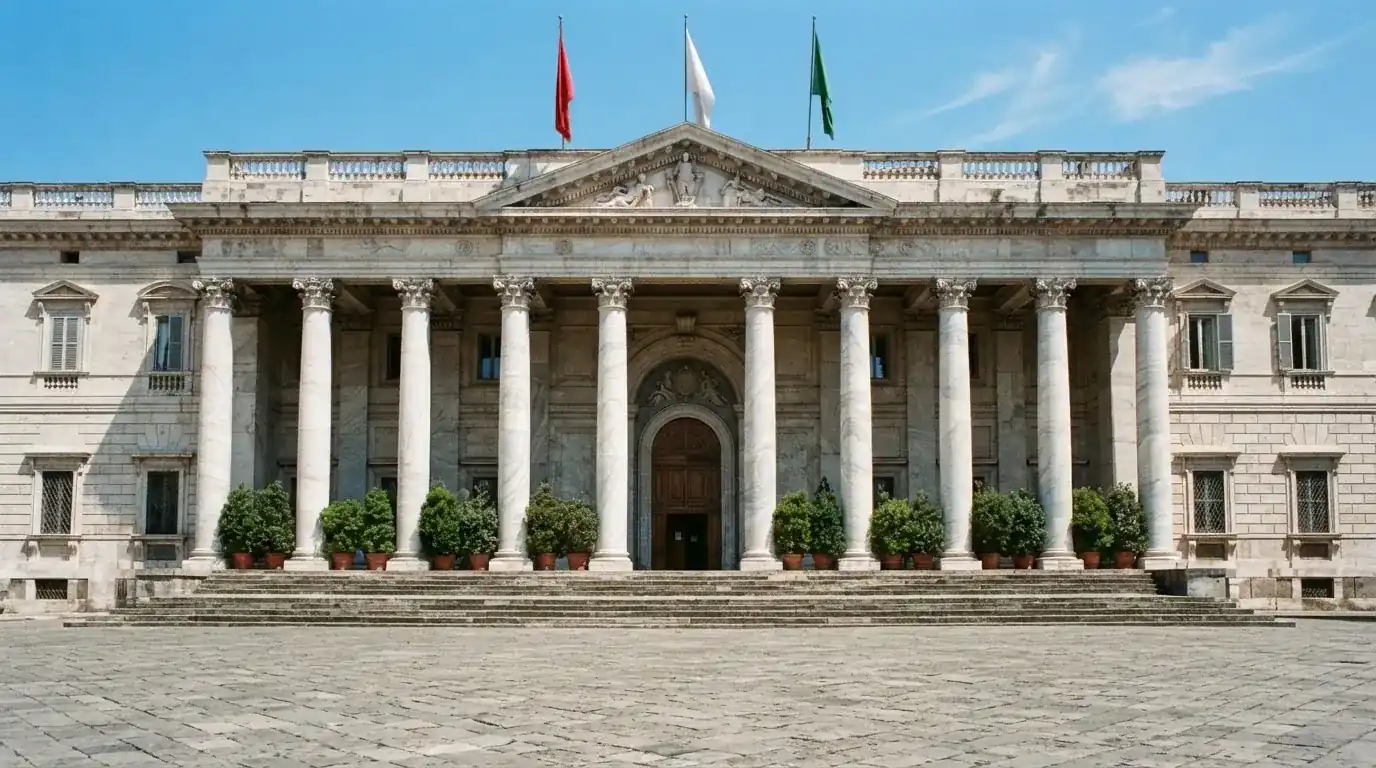 Palazzo istituzionale con bandiere al vento in una piazza soleggiata — casinò che accettano bitcoin